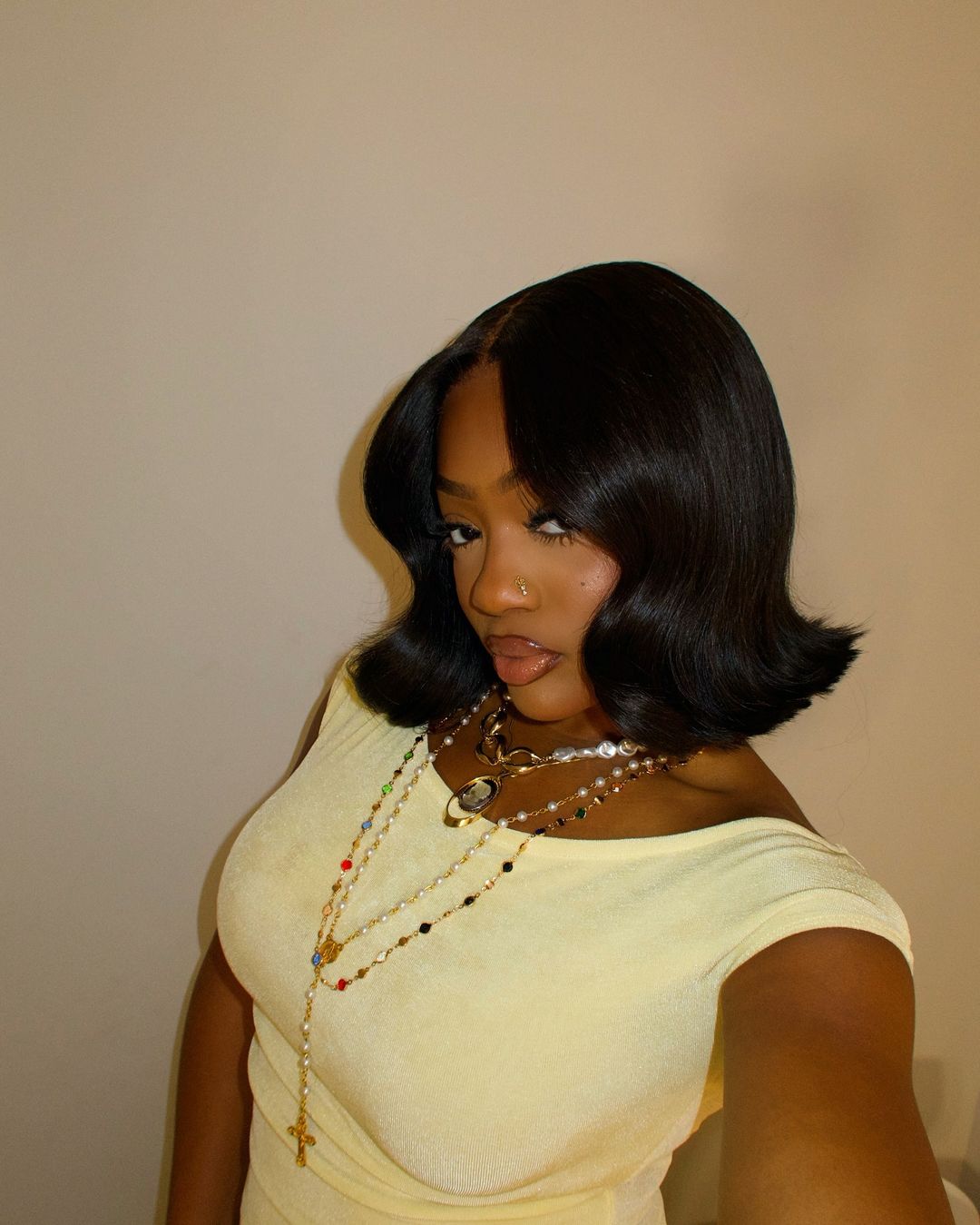 Middle parted layered upturned wavy 5x5 lace closure wig